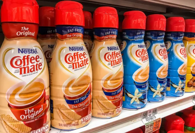 grocery store shelf of coffee mate coffee creamers