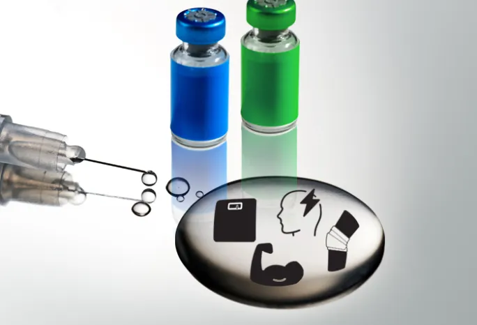 syringe with puddle of clear liquid and 2 vials