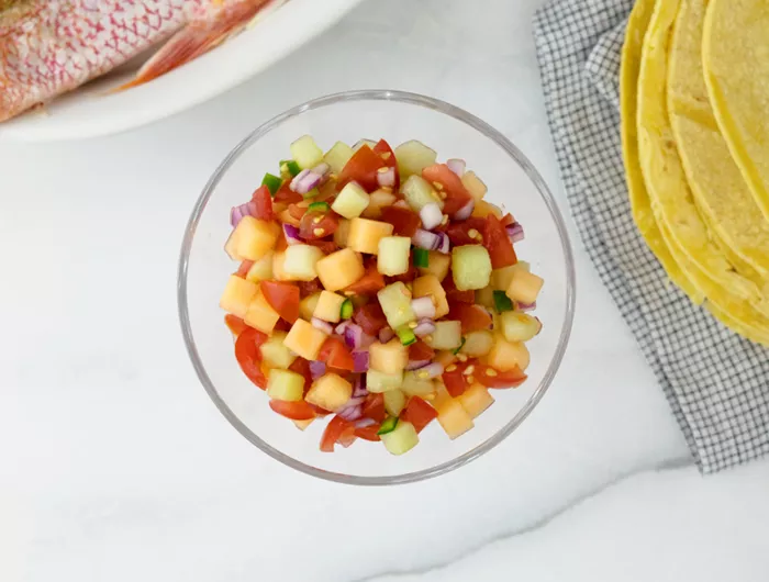 a bowl of melon salsa