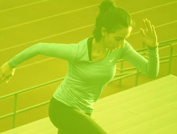 woman running up stairs