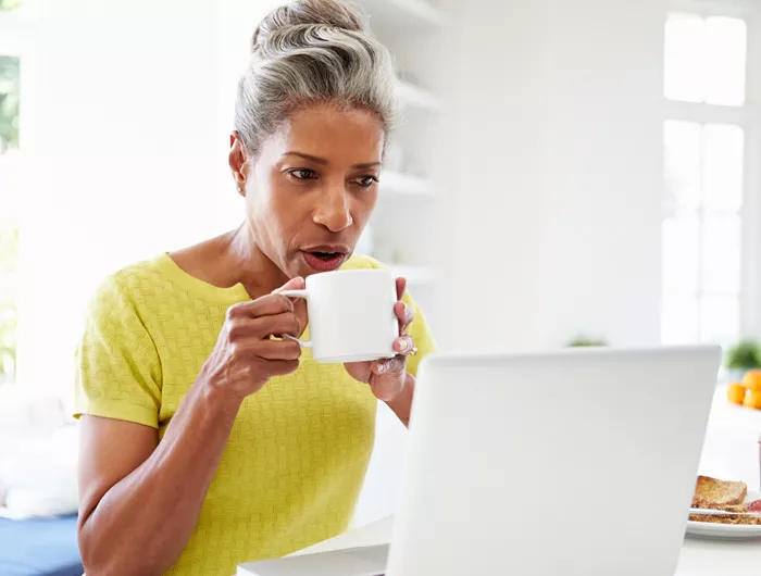 a woman drinking coffee