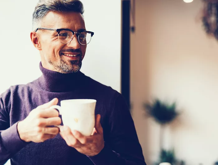 man drinking coffee