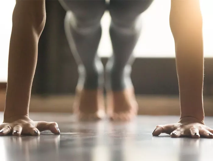 person doing straight-arm plank exercise
