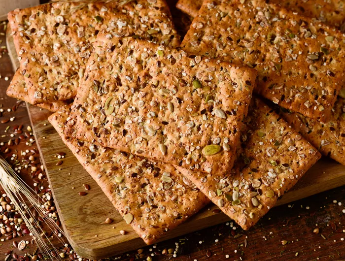 crackers laid out on a cutting board