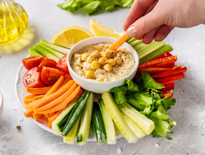 plate of veggie with dip in the midde