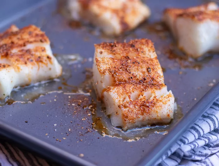 roasted white fish on a sheet pan