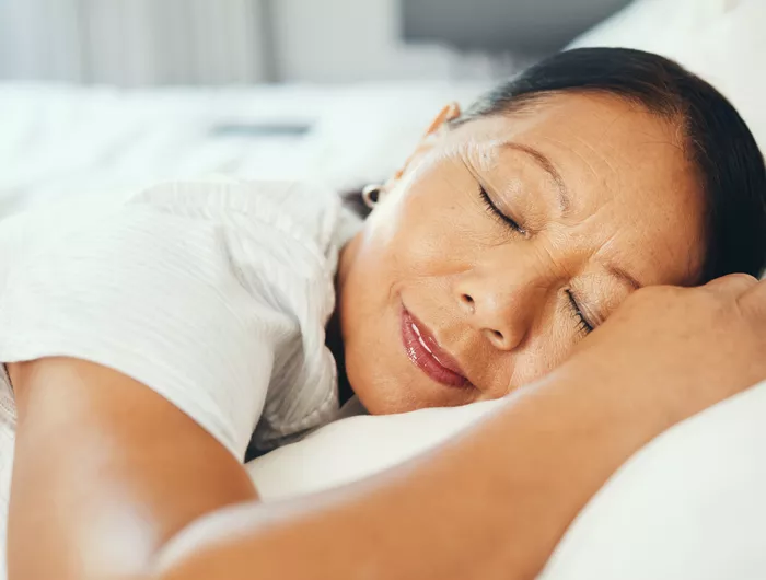 woman's head on a pillow, sleeping