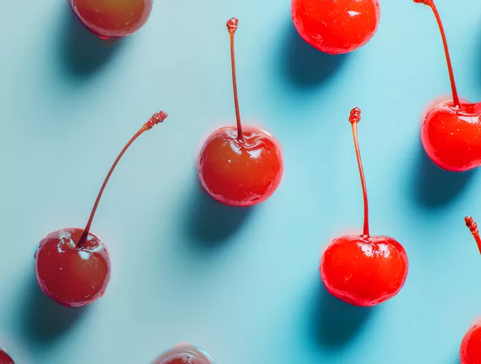regular cherries fading into maraschino cherries