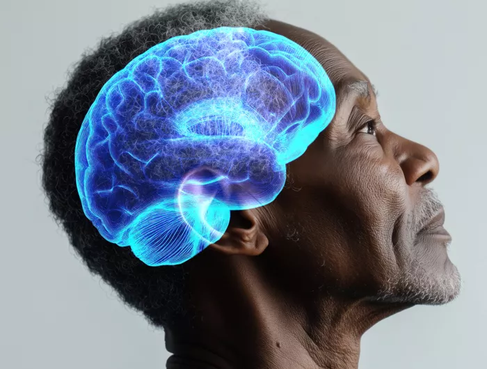 African American man in profile with overlay of a stylized brain