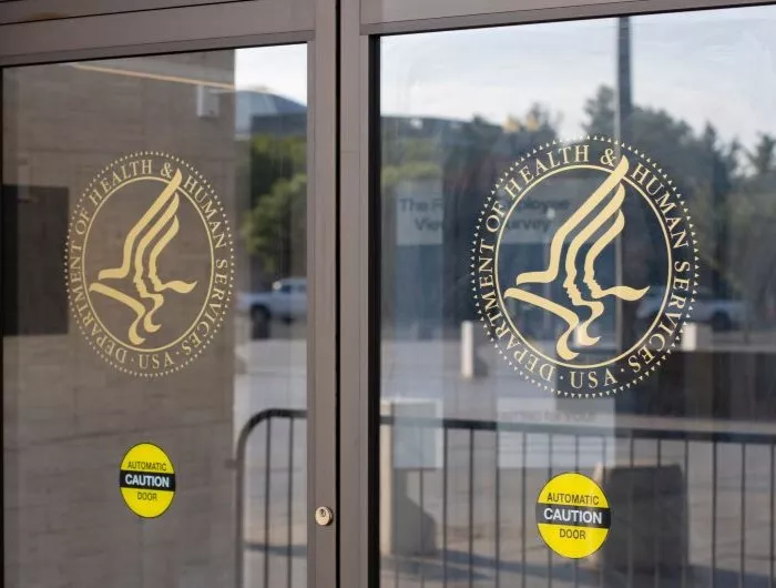 Washington, DC, USA - June 24, 2022: The symbol of the U.S. Department of Health and Human Services is seen at the entrance to its headquarters in the Hubert H. Humphrey Building in Washington, DC.