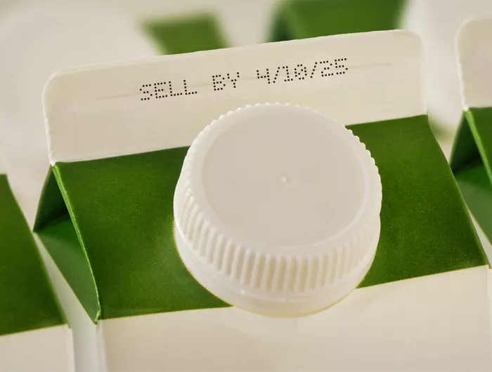milk cartons showing a sell-by date