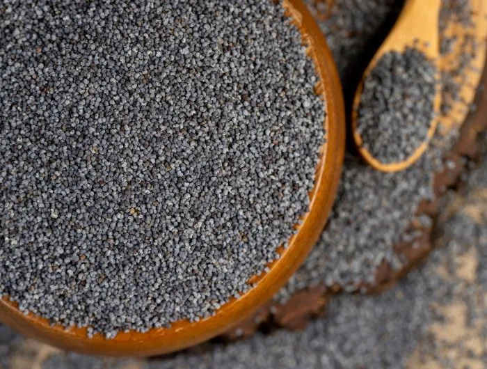 A bowl of poppy seeds used for cooking.