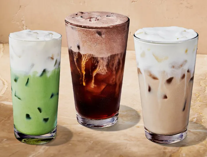 3 Starbucks drinks topped with protein phone