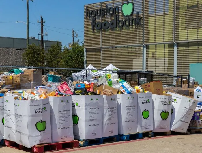 Local charity food bank preparing food kits during national emergency