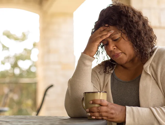 woman looking sad