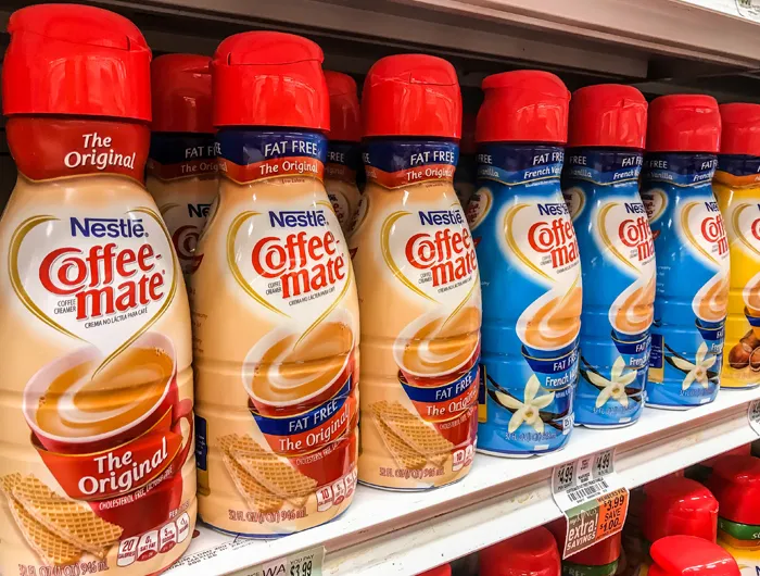 grocery store shelf of coffee mate coffee creamers
