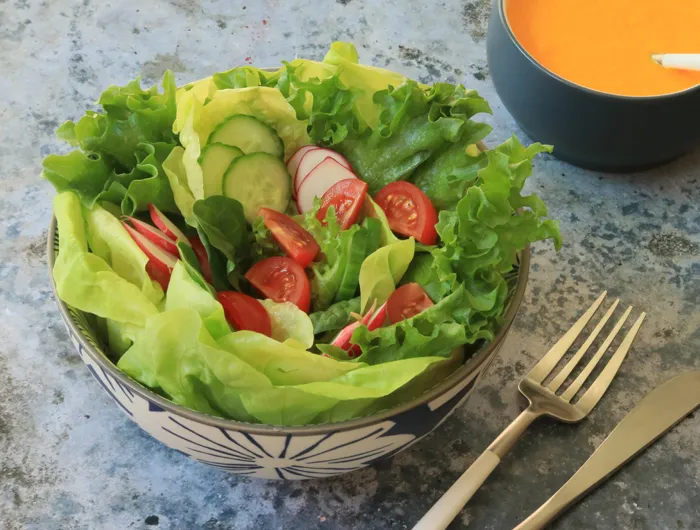 bowl of salad greens and vegetables