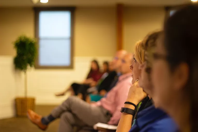 People participating in a listening session