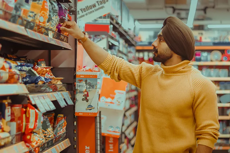 Man grocery shopping