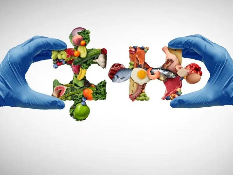 Nutrition science concept with food-group puzzle pieces held by hands in surgical gloves