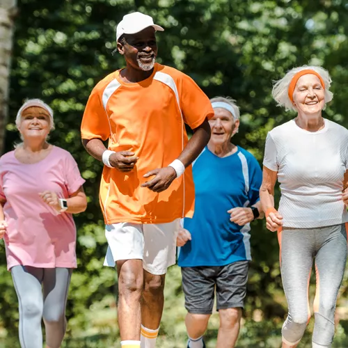 group of older people running outside