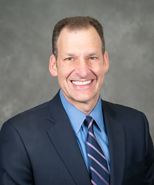 headshot of James Stein