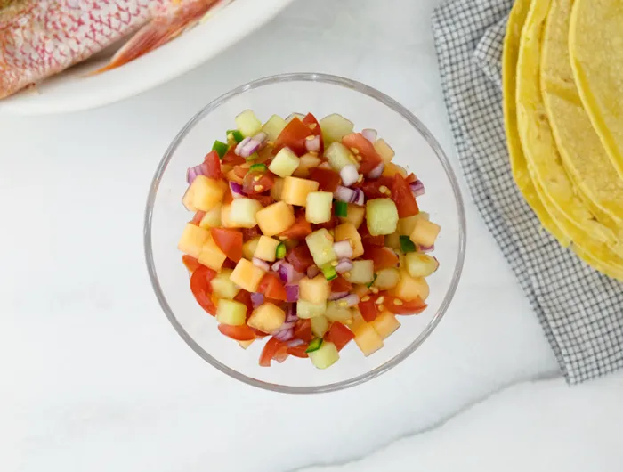a bowl of melon salsa