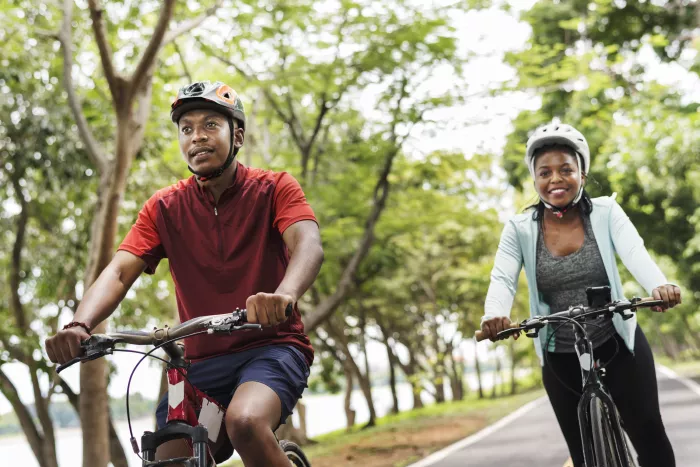 a couple riding bikes