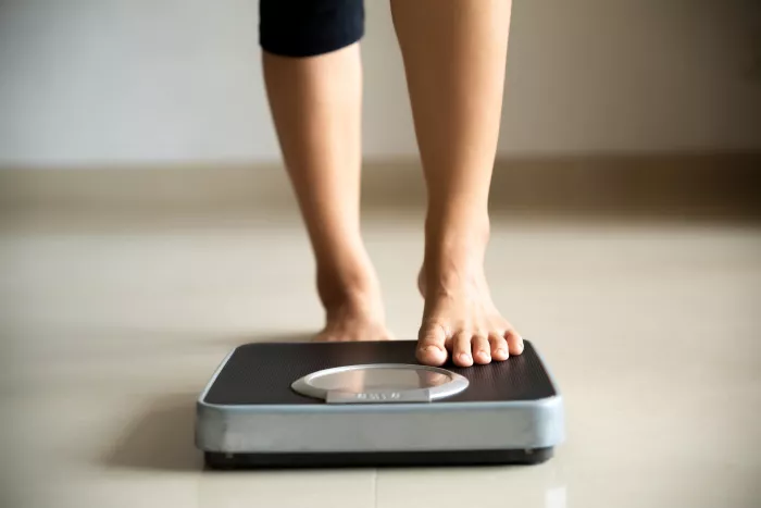stepping on scale
