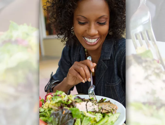 woman eating salad