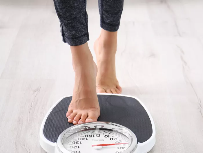 stepping onto a scale