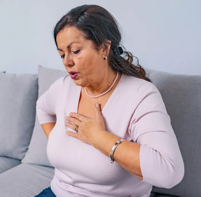 woman having chest pains