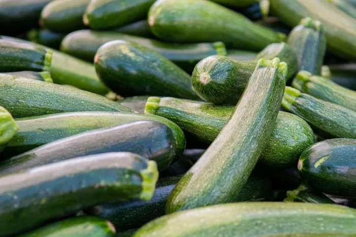 seasonal produce - Fresh zucchini for sale at a farmers market