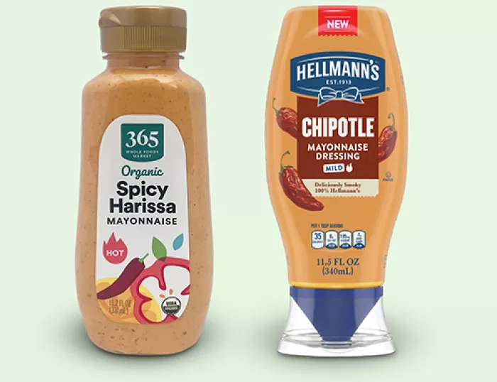 bottle of 365 Organic harissa mayo and Hellmann's Chipotle mayo