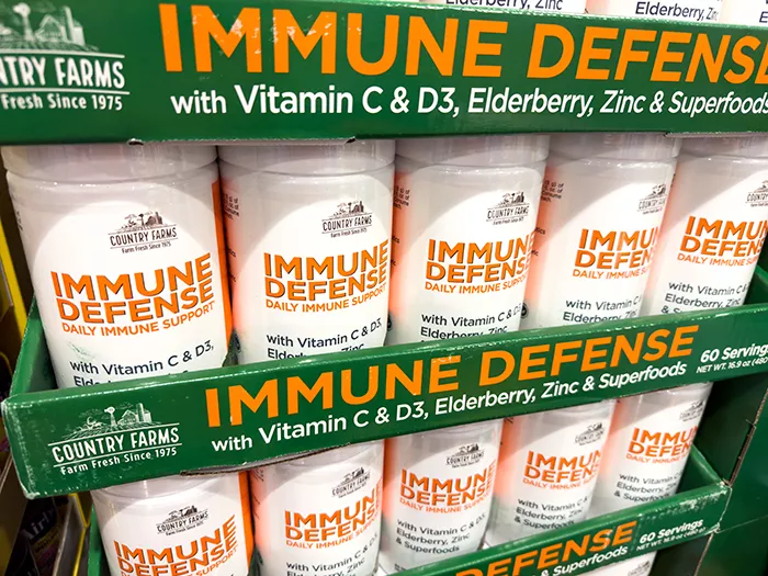 store display of Country Farms immune Defense daily immune support powder.