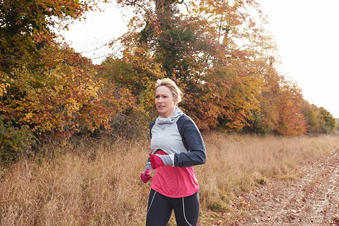 woman running in a field