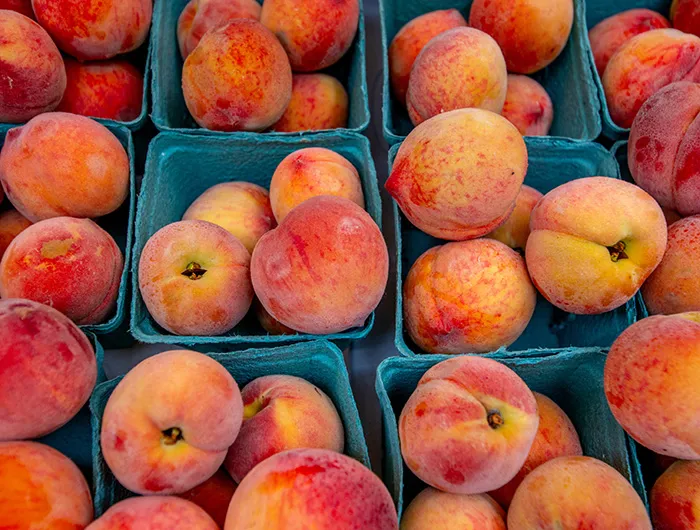 Peaches in containers