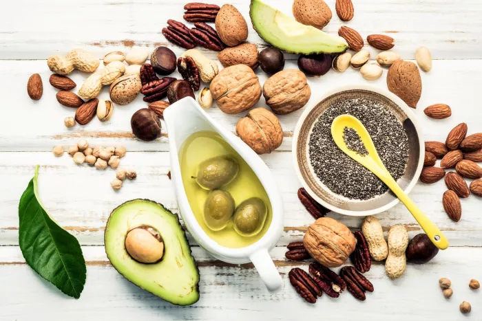 food sources of omega 3 and unsaturated fats include fish, avocado, nuts, seeds, and seed oils