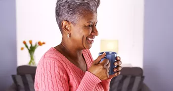 woman holding a coffee mug