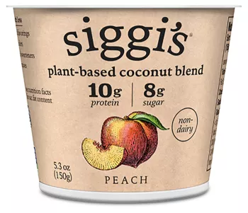 cup of Siggi's plant-based coconut blend peach yogurt.