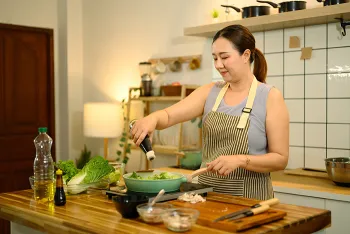 woman cooking in her kitchen