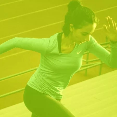 woman running up stairs