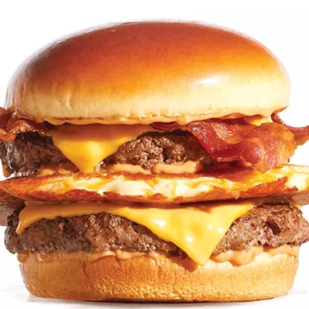 double bacon cheeseburger with a pancake in the middle