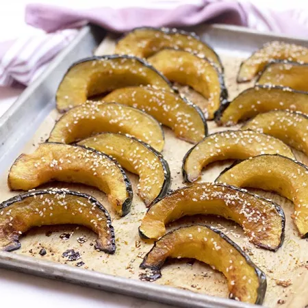 maple sesame winter squash on sheet pan