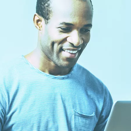 man looking at computer screen