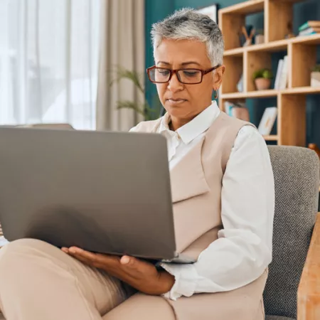 woman looking at laptop