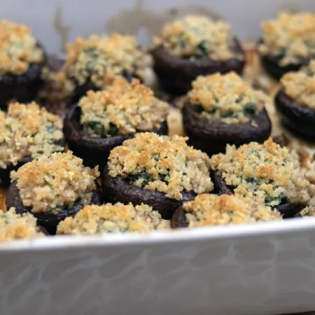 metal pan filled with stuffed mushrooms