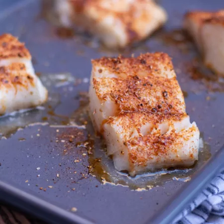 roasted white fish on a sheet pan