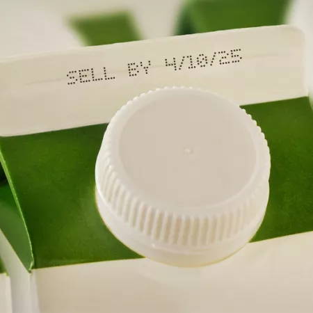 milk cartons showing a sell-by date