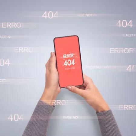 Hands holding smart phone with error 404 or not found icon